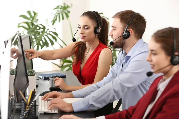 Technical support agents working in office