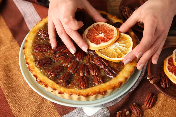 Female Confectioner Decorating Tasty Pecan Pie Table Closeup — Stock Photo, Image