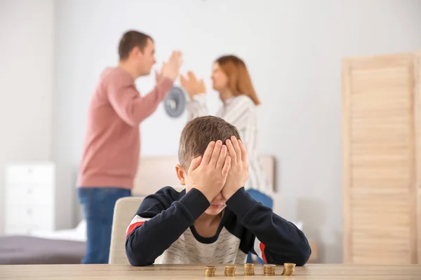 Sad Little Boy Coins His Quarreling Parents Home Concept Child — Stock Photo, Image