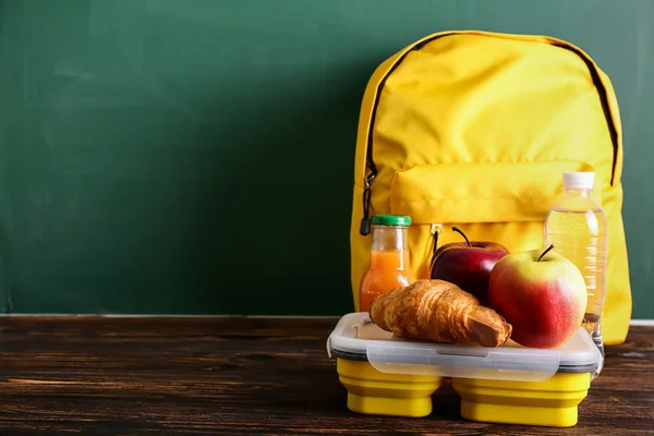 Schoolbag Lunch Box Tasty Food Table — Stock Photo, Image