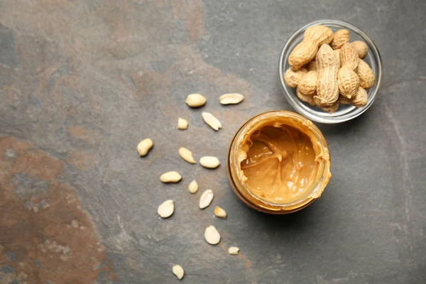 Jar Tasty Peanut Butter Grey Background — Stock Photo, Image