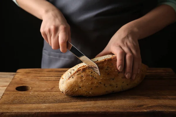Young Woman Cutting Fresh Bread Table Closeup — Stock Photo, Image