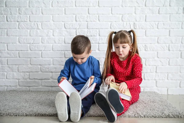 Cute Little Children Reading Books White Brick Wall — Stock Photo, Image