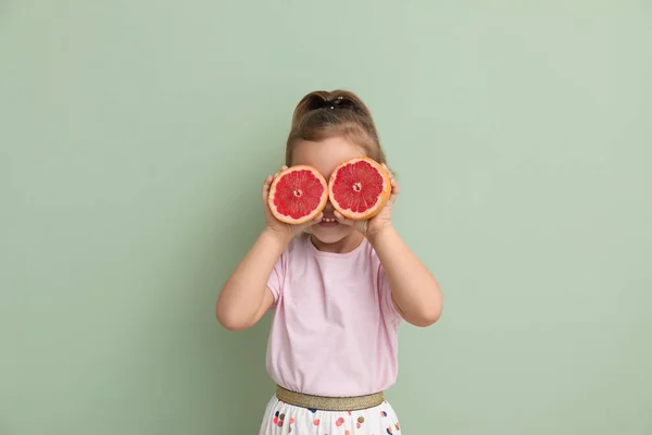 Portrait Cute Little Girl Halves Grapefruit Color Background — Stock Photo, Image