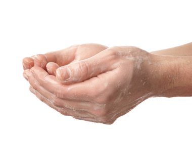 Beyaz arka planda ellerini yıkayan adam.