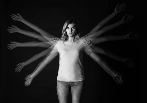 Stroboscopic Photo Young Woman Moving Arms Dark Background — Stock Photo, Image