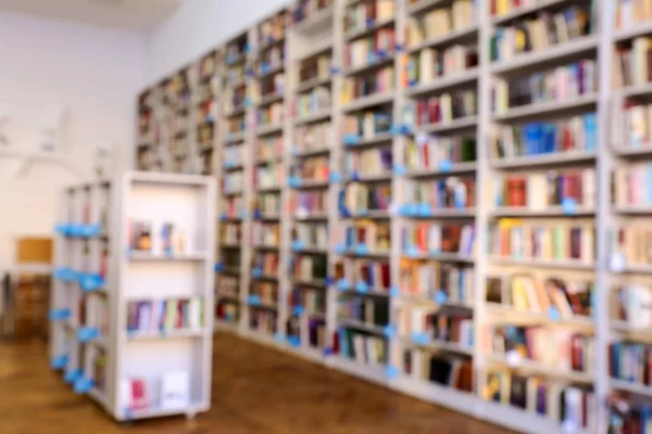 Many Books Shelves Modern Library Blurred View — Stock Photo, Image