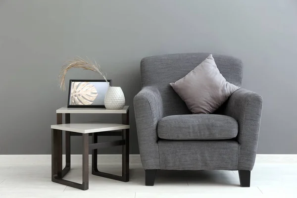 Comfortable Armchair Table Grey Wall — Stock Photo, Image