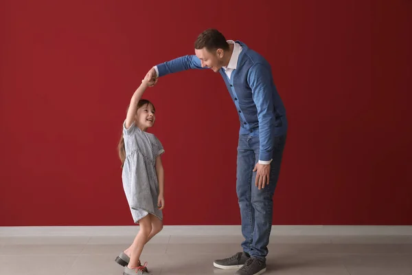 Father His Cute Little Daughter Dancing Color Wall — Stock Photo, Image