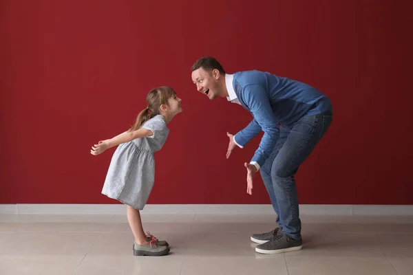 Father His Cute Little Daughter Dancing Color Wall — Stock Photo, Image