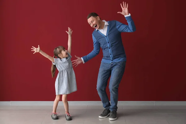 Father His Cute Little Daughter Dancing Color Wall — Stock Photo, Image