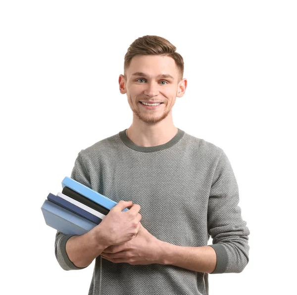 Jovem Bonito Com Livros Sobre Fundo Branco — Fotografia de Stock