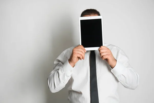 Businessman Hiding Face Tablet Computer Light Background — Stock Photo, Image