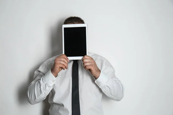 Businessman Hiding Face Tablet Computer Light Background — Stock Photo, Image