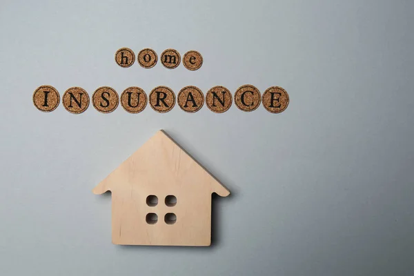 Wooden Figure House Text Home Insurance Grey Background — Stock Photo, Image