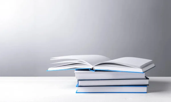 Many Books Table Grey Background — Stock Photo, Image