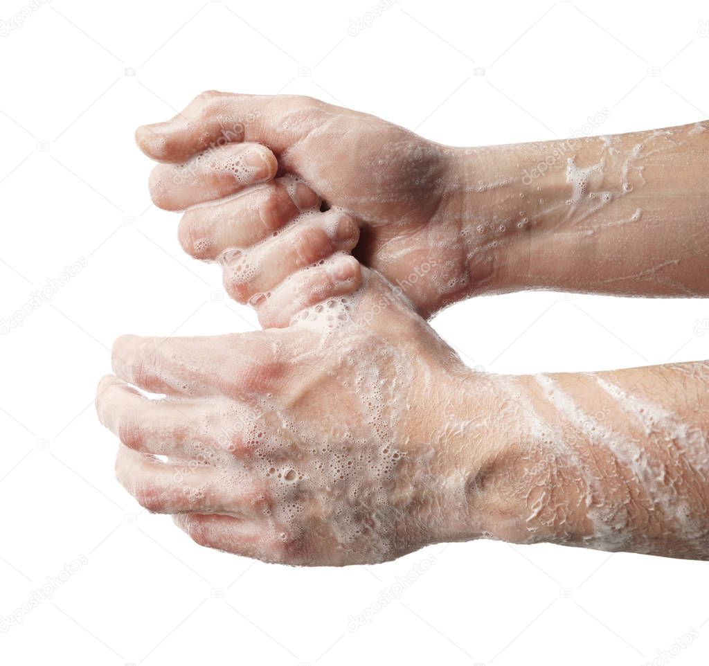 Man washing hands on white background