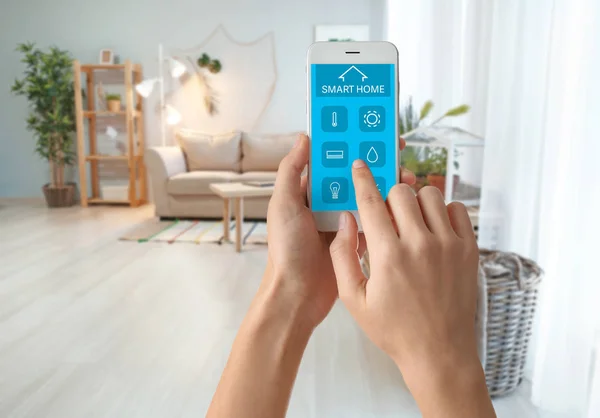 Woman Using Mobile Phone Application Smart Home Automation Room — Stock Photo, Image