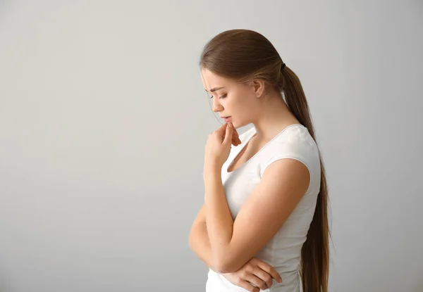 Thoughtful Young Woman Light Background — Stock Photo, Image