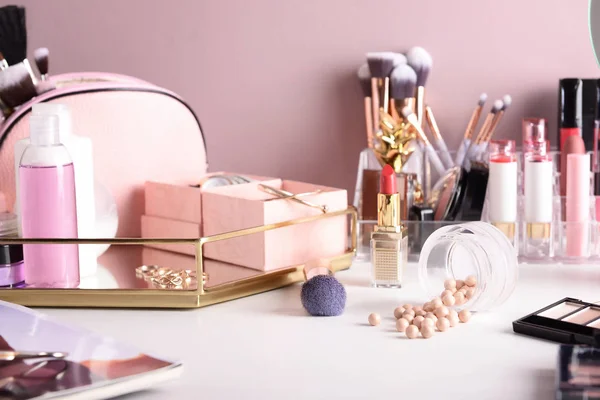 Dressing table with professional makeup cosmetics and accessories