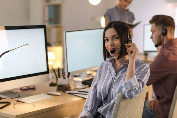 Portrait of technical support agent in office