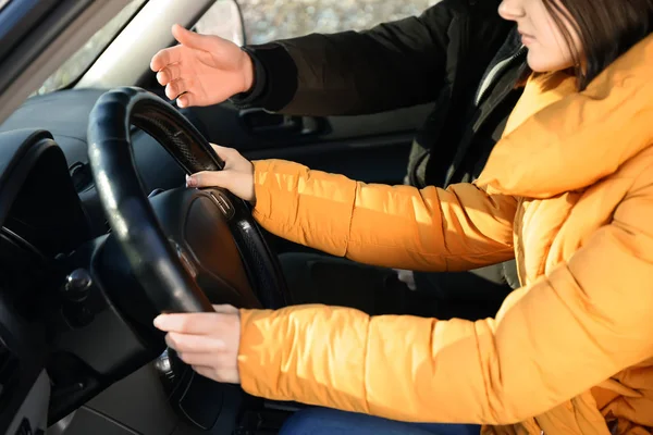 Young woman passing driving license test