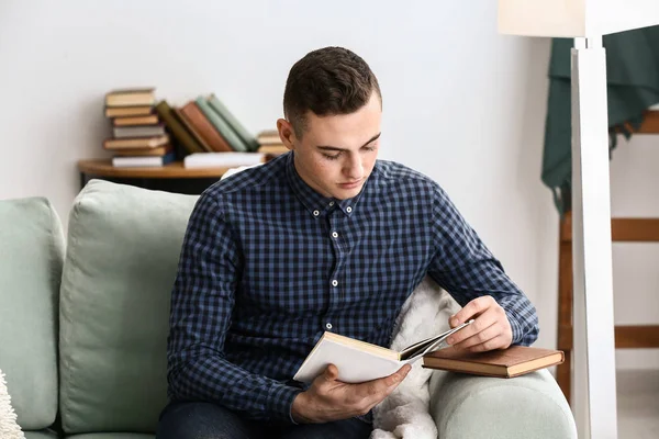 Handsome Teenage Boy Reading Book Home — Stock Photo, Image