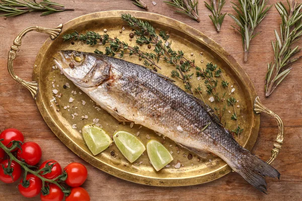 Tray Tasty Cooked Seabass Fish Wooden Background — Stock Photo, Image