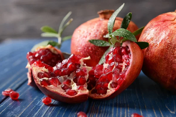 Ripe Pomegranates Color Wooden Table — Stock Photo, Image