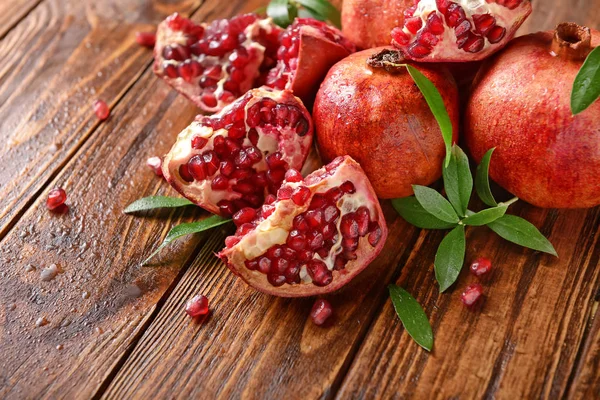Ripe Pomegranates Wooden Table — Stock Photo, Image