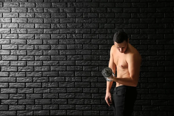 Sporty Young Man Dumbbell Dark Brick Wall — Stock Photo, Image