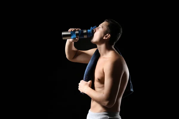 Sporty Young Man Bottle Water Dark Background — Stock Photo, Image