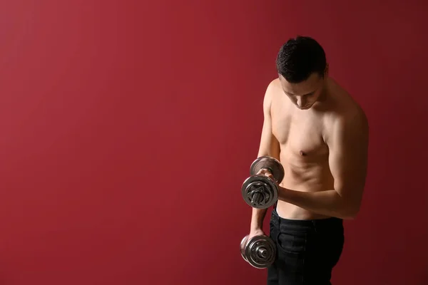Sporty Young Man Dumbbells Color Background — Stock Photo, Image