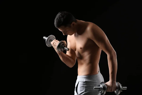 Sporty Young Man Training Dumbbells Dark Background — Stock Photo, Image