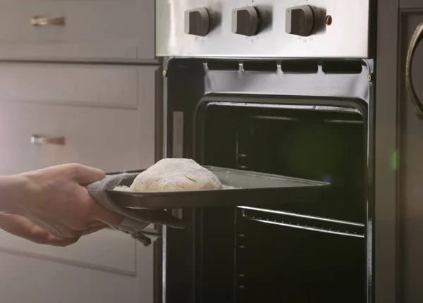 Woman Putting Baking Tray Raw Dough Bread Oven — Stock Photo, Image