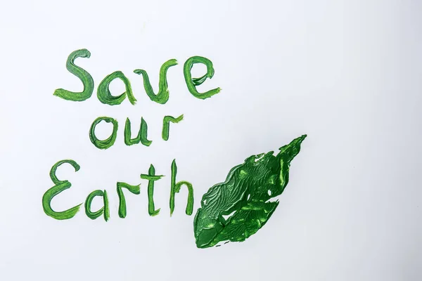 Text Our Earth Leaf Print White Background — Stock Photo, Image