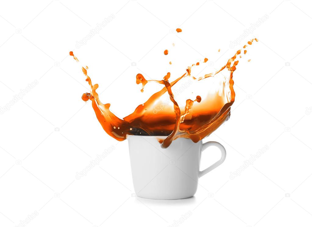 Splash of coffee in cup on white background