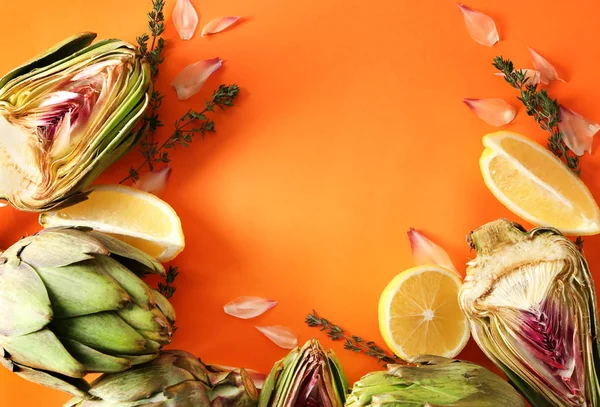 Tasty Raw Artichokes Lemon Color Background — Stock Photo, Image