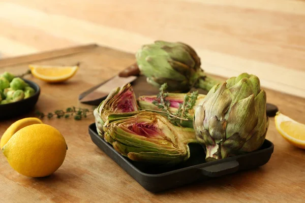 Pan Tasty Raw Artichokes Thyme Wooden Table — Stock Photo, Image