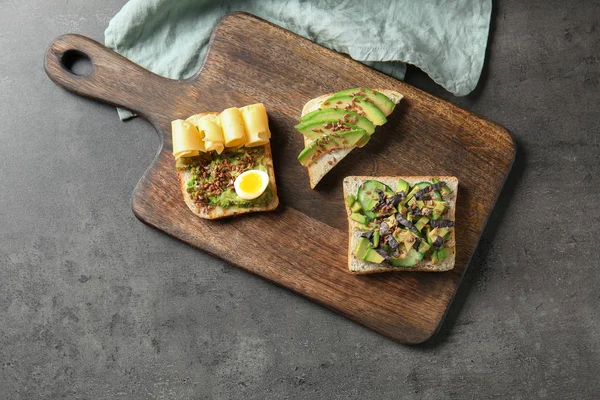 Different Tasty Sandwiches Avocado Grey Table — Stock Photo, Image