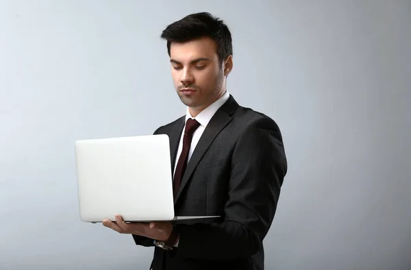 Portrait Handsome Young Businessman Laptop Light Background — Stock Photo, Image