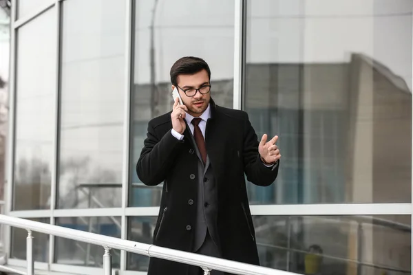 Handsome Young Businessman Talking Mobile Phone Outdoors — Stock Photo, Image