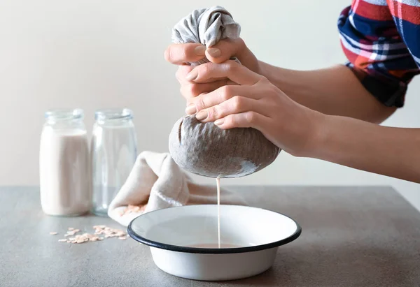 Woman Preparing Tasty Oat Milk Table — Stock Photo, Image