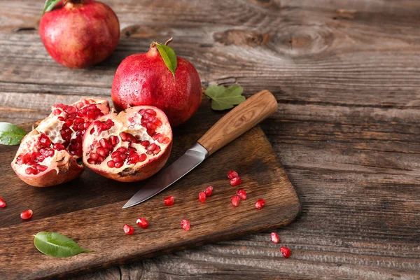 Cutting Board Ripe Pomegranates Knife Wooden Table — Stock Photo, Image
