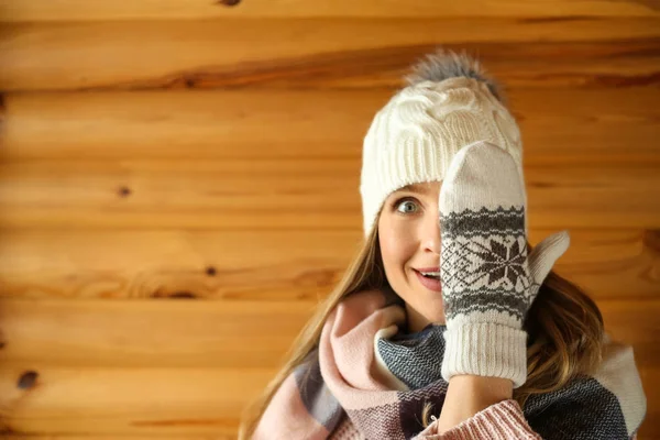 Emotional Woman Covering Eye Hand Wooden Background — Stock Photo, Image