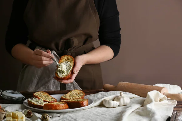 Woman Spreading Tasty Garlic Bread Cheese Kitchen — Stock Photo, Image
