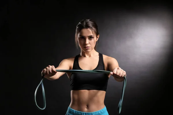 Sporty Young Woman Resistance Band Dark Background — Stock Photo, Image