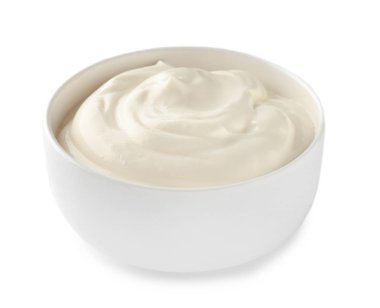 Beyaz zemin üzerine lezzetli yoğurt ile kase