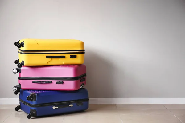 Packed Suitcases Light Wall — Stock Photo, Image