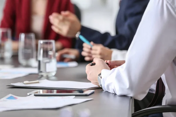 Young businessman at meeting in office — Stock Photo, Image